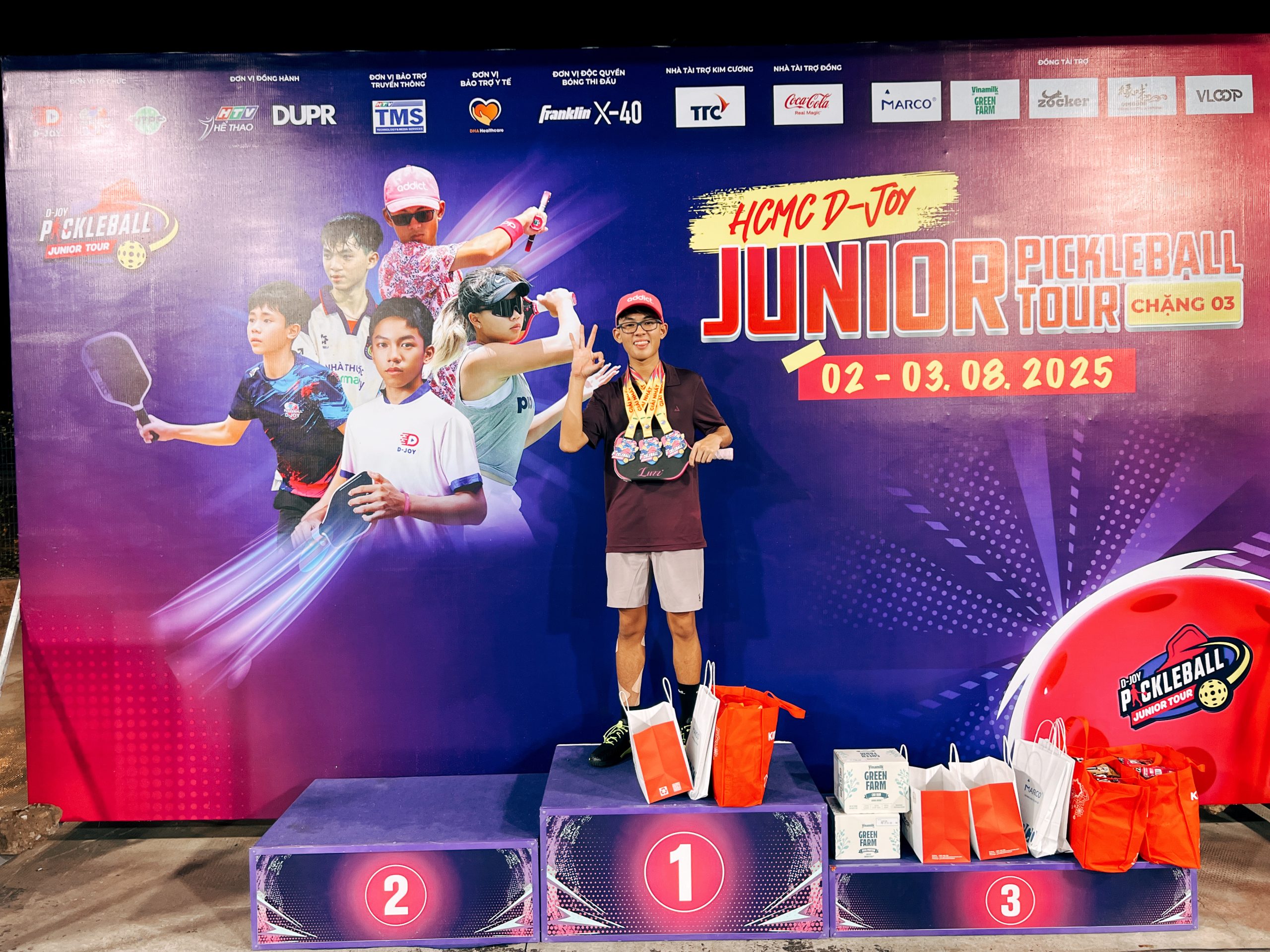 Rex on medal stand in Hong Kong