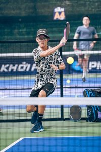 Rex playing pickleball in Danang